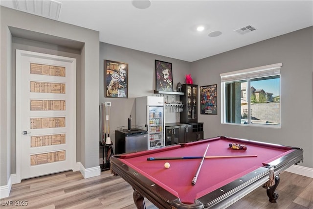 game room with pool table, wood finished floors, visible vents, and baseboards