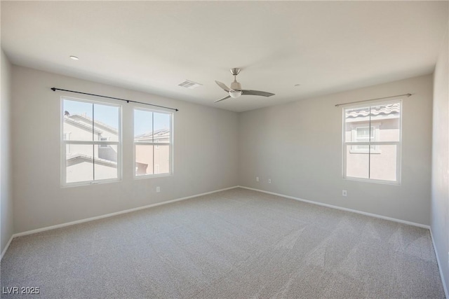 3158 Teaderman Walk, Henderson, NV 89044 - unfurnished room with ceiling fan, healthy amount of natural light, light colored carpet, and baseboards