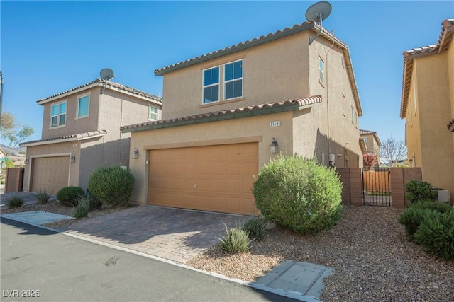 3158 Teaderman Walk, Henderson, NV 89044 - mediterranean / spanish-style house with a garage, stucco siding, and a tiled roof