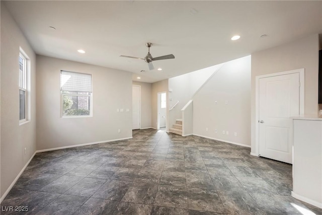 3158 Teaderman Walk, Henderson, NV 89044 - unfurnished room featuring plenty of natural light, stairway, baseboards, ceiling fan, and recessed lighting