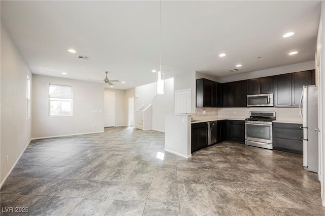 3158 Teaderman Walk, Henderson, NV 89044 - kitchen featuring stainless steel appliances, baseboards, open floor plan, recessed lighting, and ceiling fan