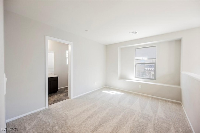 3158 Teaderman Walk, Henderson, NV 89044 - spare room featuring carpet floors, healthy amount of natural light, and baseboards