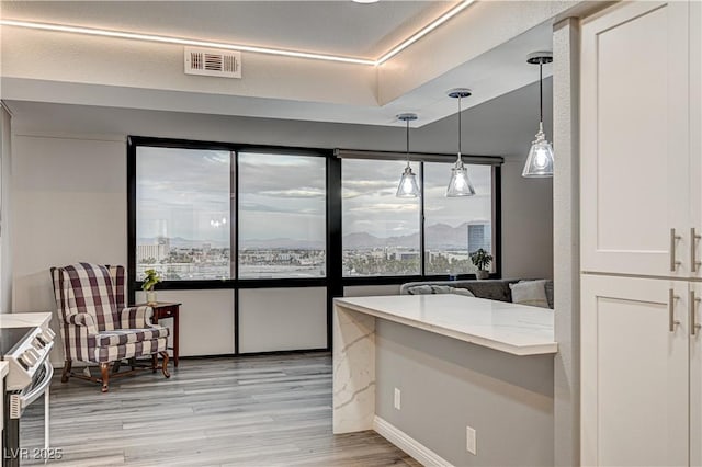 205 E Harmon Ave Unit 1010, Las Vegas, NV 89169 - interior space with wood finished floors and visible vents
