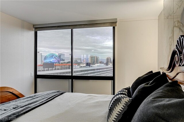 205 E Harmon Ave Unit 1010, Las Vegas, NV 89169 - bedroom with a city view