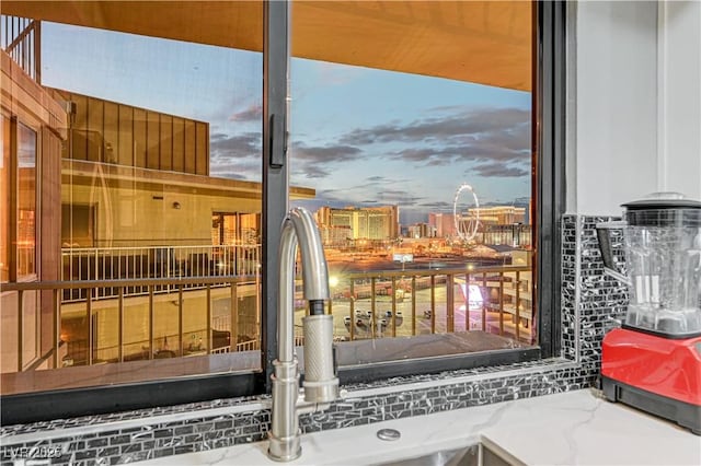205 E Harmon Ave Unit 1010, Las Vegas, NV 89169 - exterior details with a view of city and stone counters