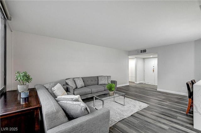 205 E Harmon Ave Unit 1010, Las Vegas, NV 89169 - living area with visible vents, baseboards, and wood finished floors