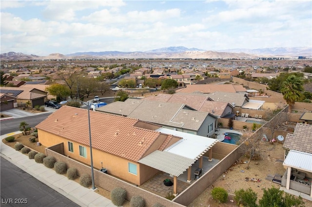 aerial view featuring a mountain view and a residential view