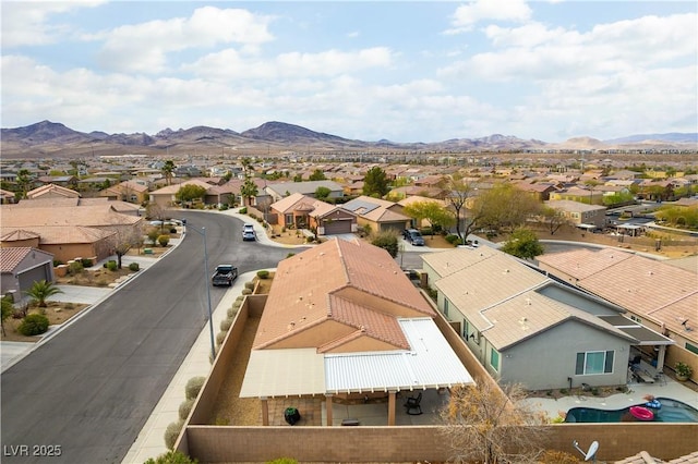 drone / aerial view featuring a mountain view and a residential view