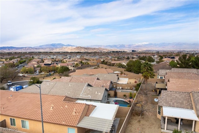 drone / aerial view featuring a mountain view and a residential view