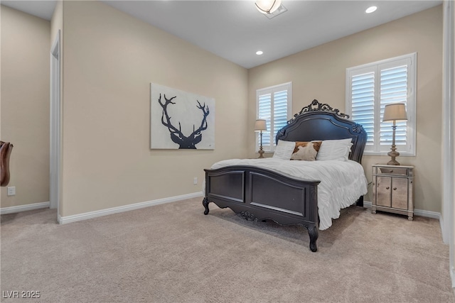 carpeted bedroom with multiple windows, recessed lighting, and baseboards