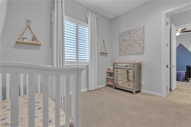 bedroom with carpet flooring and baseboards