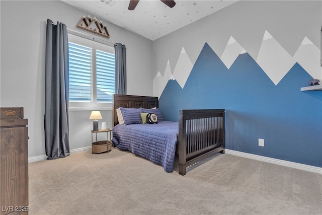 bedroom with baseboards, a ceiling fan, and carpet flooring