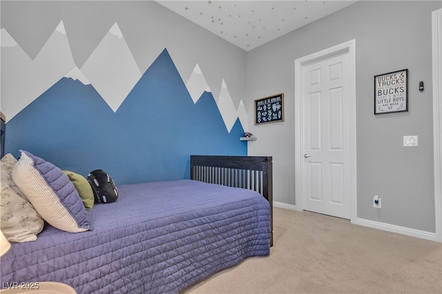 carpeted bedroom with baseboards