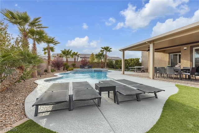 view of swimming pool with a fenced in pool, fence private yard, and a patio