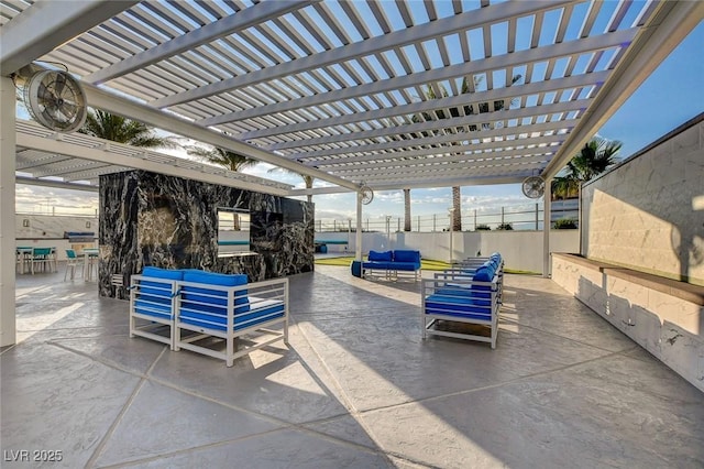 view of patio / terrace featuring outdoor lounge area, fence, and a pergola