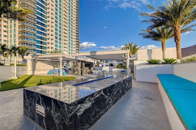 view of swimming pool featuring a pergola