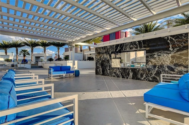 view of patio with an outdoor hangout area and a pergola