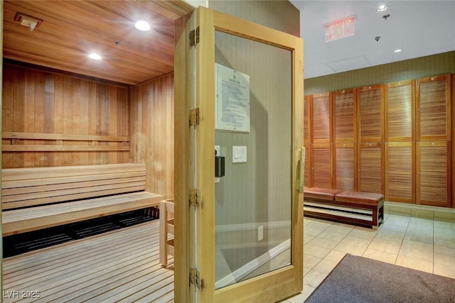 view of sauna with recessed lighting and tile patterned flooring