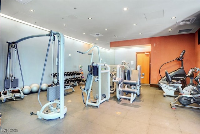 gym featuring recessed lighting and visible vents