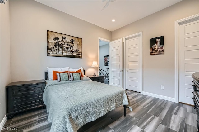 bedroom featuring recessed lighting, baseboards, and wood tiled floor