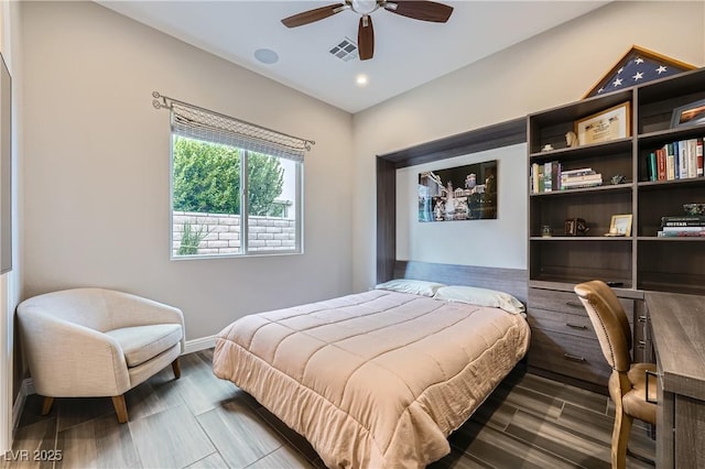 bedroom featuring visible vents, baseboards, wood finish floors, recessed lighting, and a ceiling fan