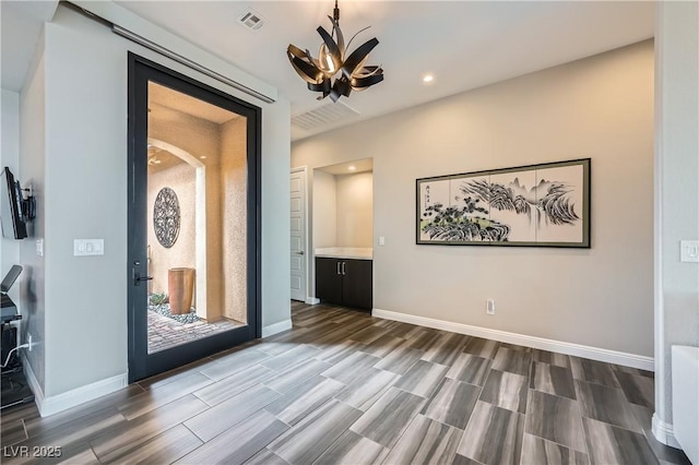 294 Besame Ct, Las Vegas, NV 89138 - interior space with wood tiled floor, baseboards, and visible vents