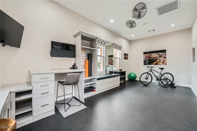 office featuring recessed lighting, baseboards, and visible vents