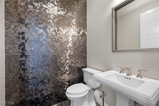 294 Besame Ct, Las Vegas, NV 89138 - half bathroom featuring a sink and toilet
