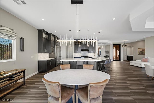294 Besame Ct, Las Vegas, NV 89138 - dining room with visible vents, recessed lighting, baseboards, and dark wood-style floors