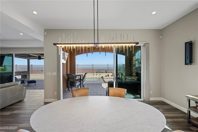294 Besame Ct, Las Vegas, NV 89138 - dining room featuring recessed lighting, a healthy amount of sunlight, and wood finished floors