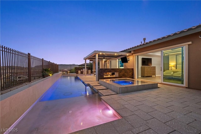 294 Besame Ct, Las Vegas, NV 89138 - view of swimming pool featuring a patio, an in ground hot tub, fence, and a fenced in pool