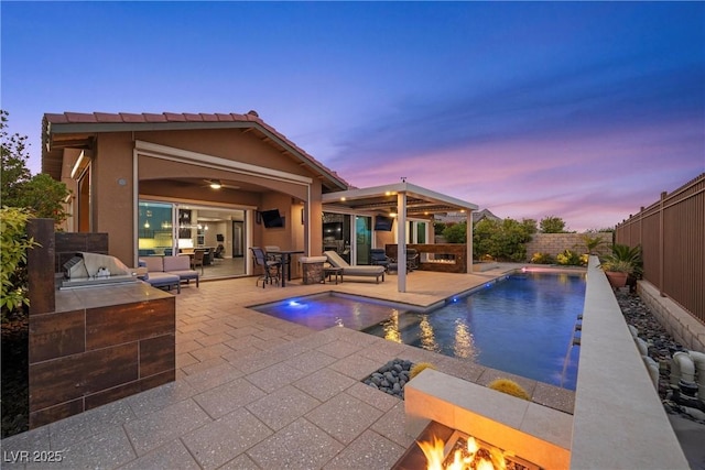294 Besame Ct, Las Vegas, NV 89138 - view of swimming pool featuring ceiling fan, area for grilling, a fenced backyard, a fenced in pool, and a patio area