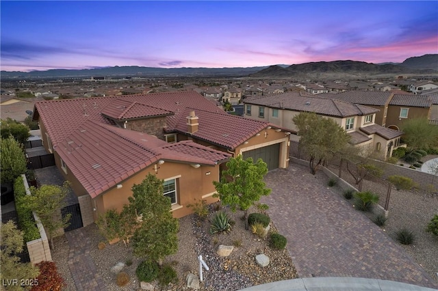 294 Besame Ct, Las Vegas, NV 89138 - aerial view at dusk featuring a residential view and a mountain view