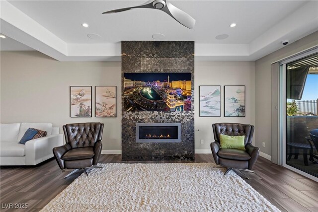 294 Besame Ct, Las Vegas, NV 89138 - living area with baseboards, a fireplace, recessed lighting, and wood finished floors