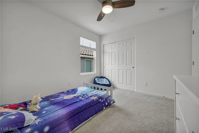 bedroom with visible vents, a ceiling fan, a closet, carpet flooring, and baseboards