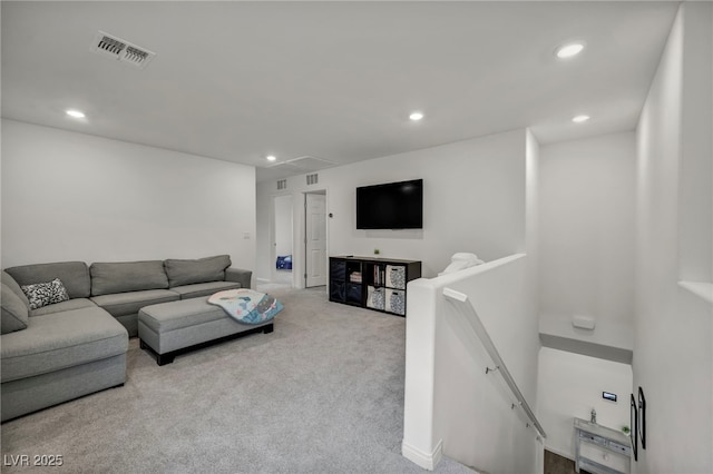 living room with attic access, carpet flooring, recessed lighting, and visible vents