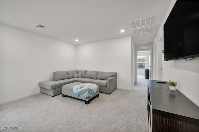 living area with recessed lighting, visible vents, carpet flooring, and baseboards