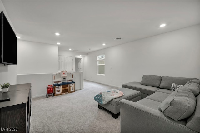 living area featuring recessed lighting, light colored carpet, visible vents, and baseboards