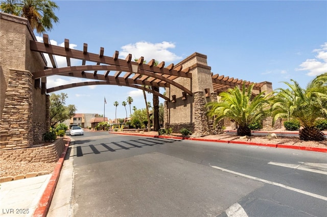 view of street with curbs