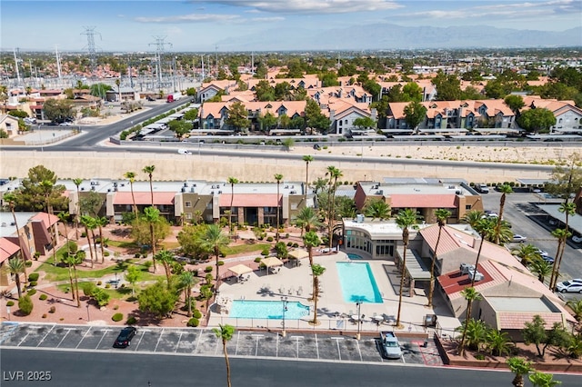 birds eye view of property featuring a mountain view and a residential view