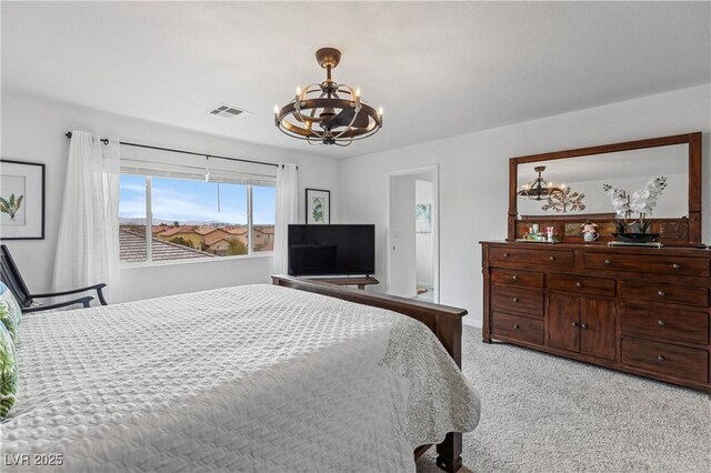 6346 Rock Strm Ln, Las Vegas, NV 89141 - bedroom with light carpet, an inviting chandelier, and visible vents