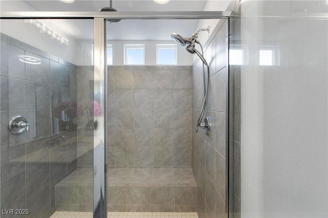 bathroom featuring a stall shower