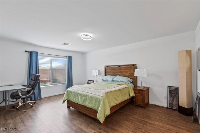 6346 Rock Strm Ln, Las Vegas, NV 89141 - bedroom featuring dark wood-style flooring, baseboards, and visible vents