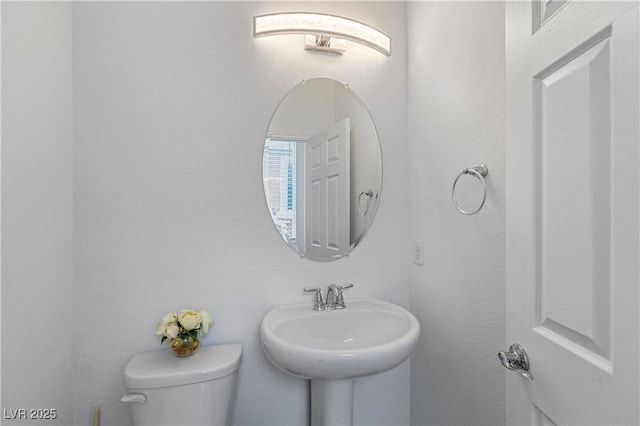 6346 Rock Strm Ln, Las Vegas, NV 89141 - bathroom featuring toilet and a sink