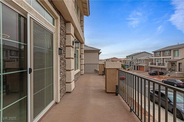 balcony featuring a residential view