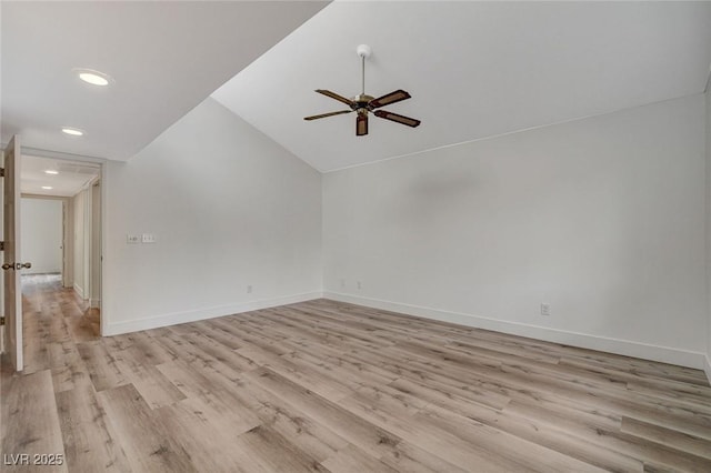 unfurnished room featuring baseboards, light wood-type flooring, and ceiling fan