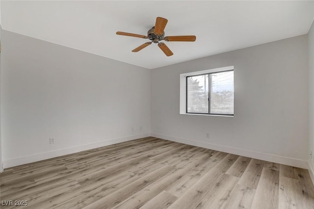 empty room with baseboards, light wood-style flooring, and a ceiling fan