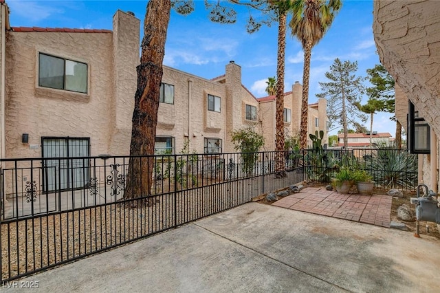 view of patio / terrace with fence