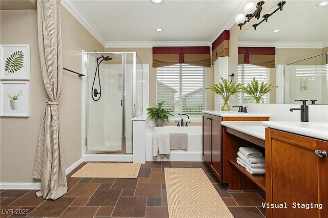 bathroom featuring a garden tub, a stall shower, vanity, and ornamental molding