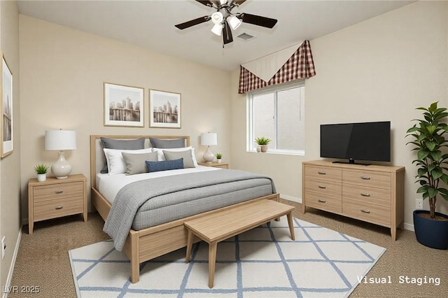 bedroom featuring visible vents, baseboards, and light carpet